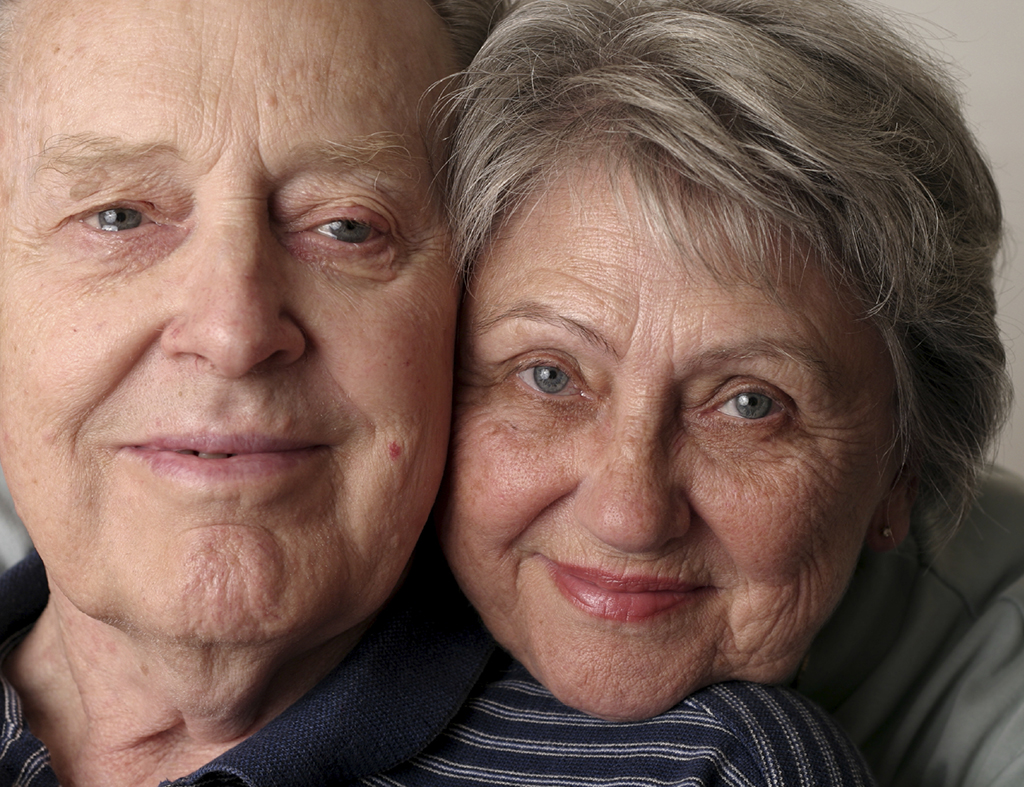 an older man and women shown close-up